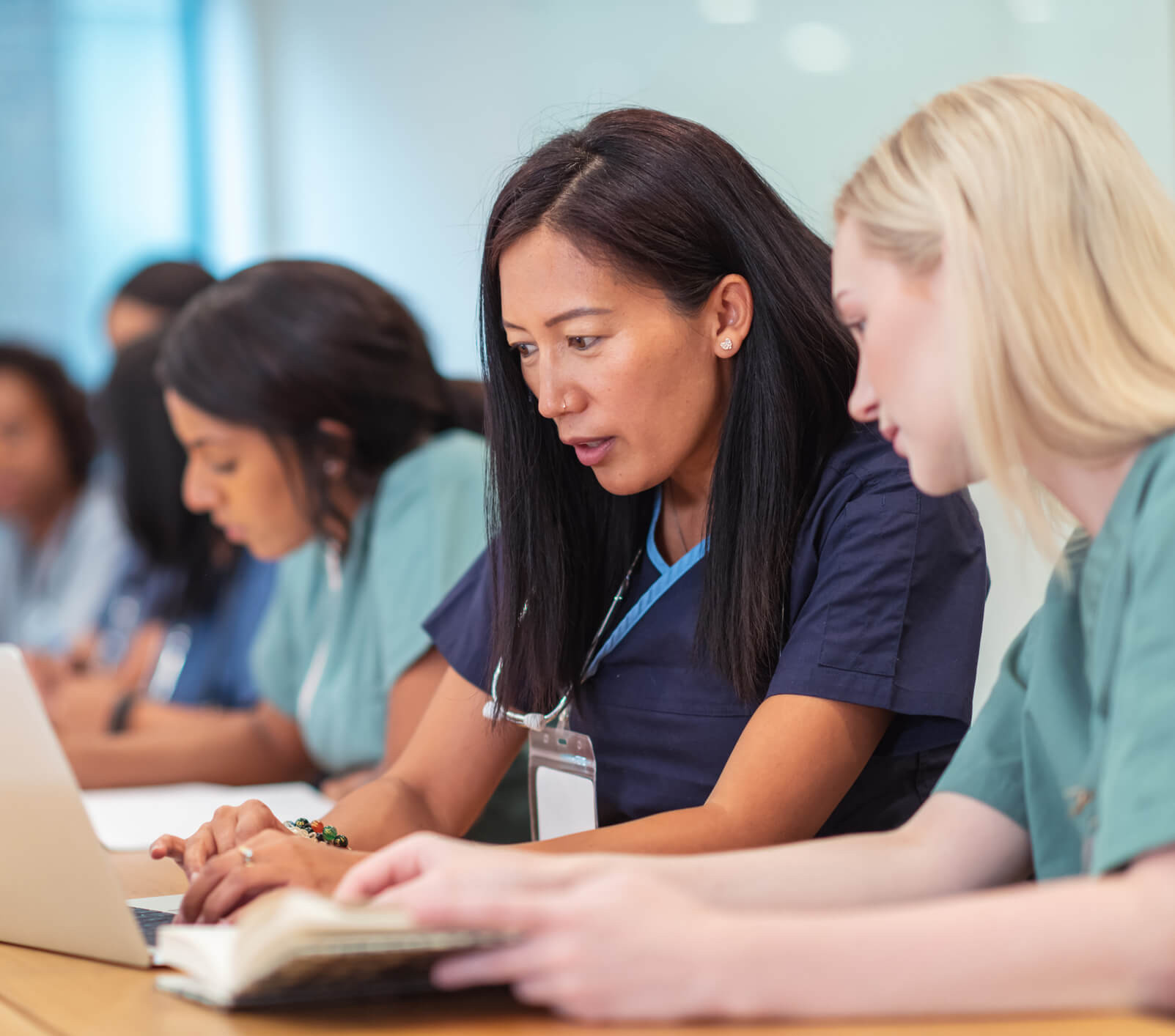 Doctors looking at computer